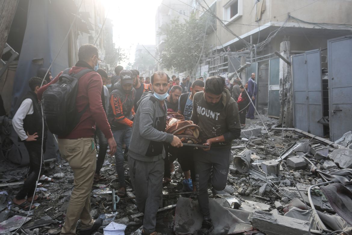 Palestinians evacuate wounded in Israeli bombardment Rafah, Gaza Strip