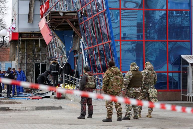 A view shows a shopping centre hit by a missile strike