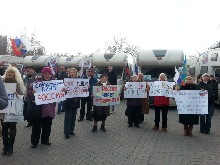 Residents of Sevastopol, Ukraine, holding pro-Russian slogans in March 2014-1708436134