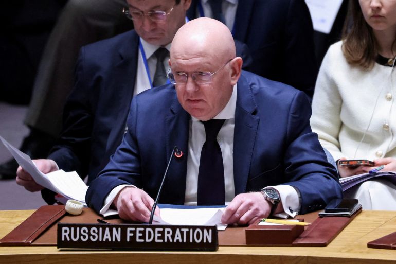 Russia's UN ambassador Vassily Nebenzia. He is sitting at a desk with the words Russian Federation in front.